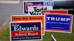 Candidate signs from 2016 displayed outside of Precinct 50. File Photo by Mike Rhodes