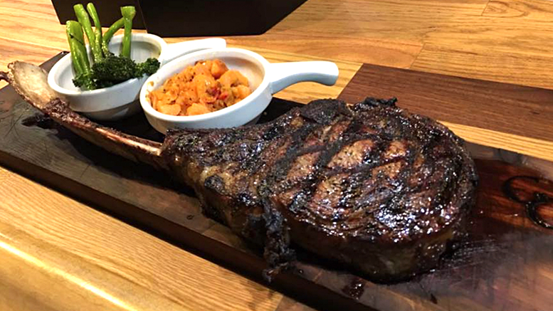 Grains & Grill— 40 ounce Champion's Reserve Tomahawk Ribeye.