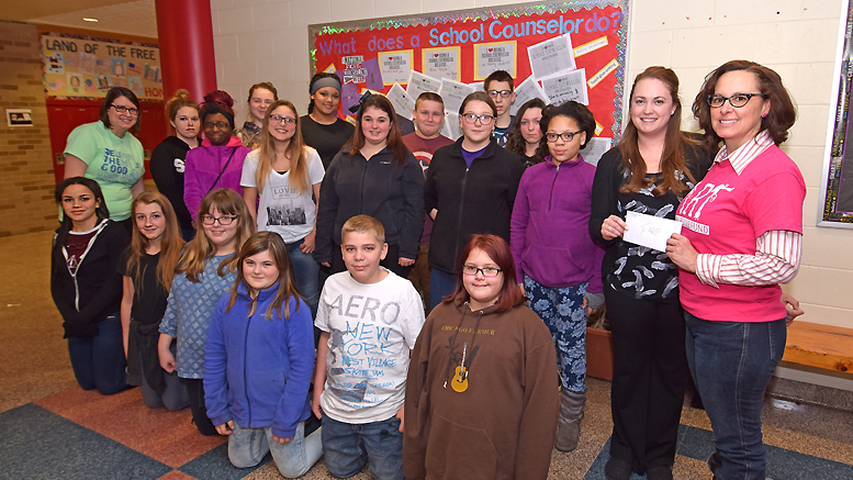 Southside Middle School's student council members with teachers Amy Pieczko (far left) and Jessie Andry (far right), with ARF Executive Director Jody Leddy (far right). Photo by: Mike Rhodes