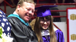 MCHS Principal Chris Walker is pictured with Kaitlyn Jamieson accepting her diploma. Photo by: Mike Rhodes