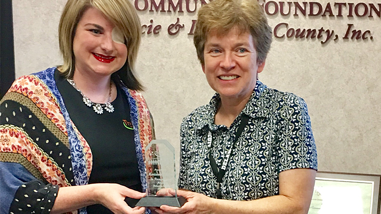 Brittani Richards (L) presents the Thrive Community Leader Award to Judge Marianne Vorhees.(R) Photo provided.