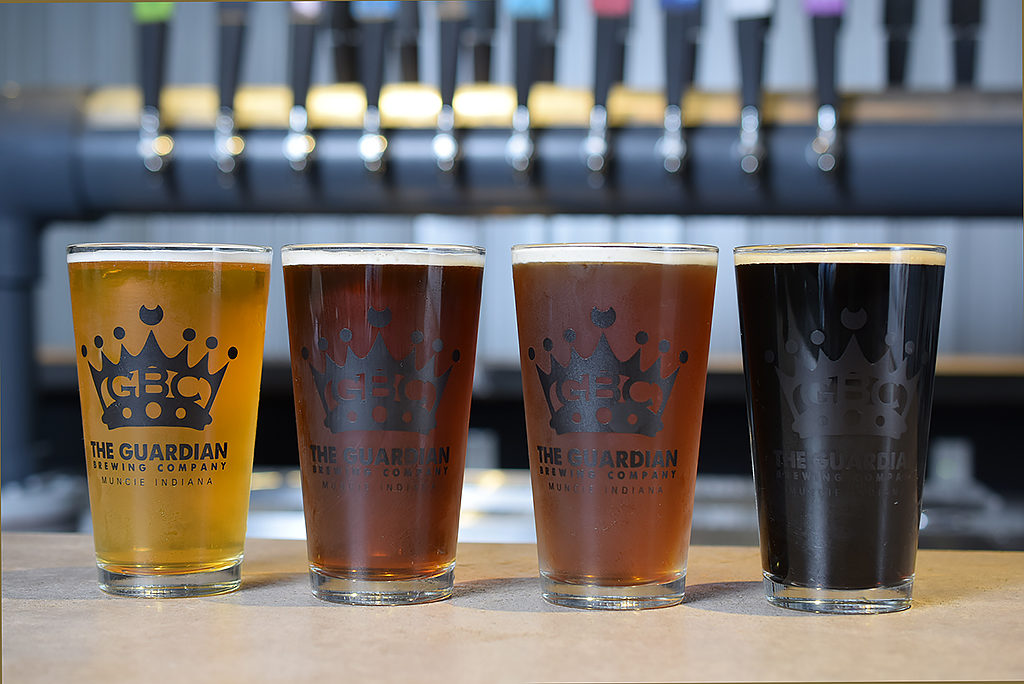 (From L-R) Four of Guardian Brewing Company's most popular beers: Chirptown Session Pale Ale, The Rez, Beauty School Dropout Amber, and Frank The Tank Coffee Stout. Photo by: Mike Rhodes