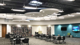 The Southern Wells Library Remodel included a new acoustical ceiling tile “cloud” feature. Work also included new casework, flooring, lighting, painting, dry-erase display surfaces, glass entry, media wall and furnishings.