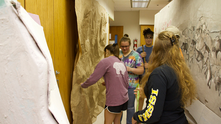 Academy students transform a classroom into a prehistoric cave for May Term. Photo provided.