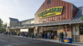 Early shoppers are pictured outside the new Fresh Thyme Farmers Market at 7am, May 17th. Photo by: Mike Rhodes