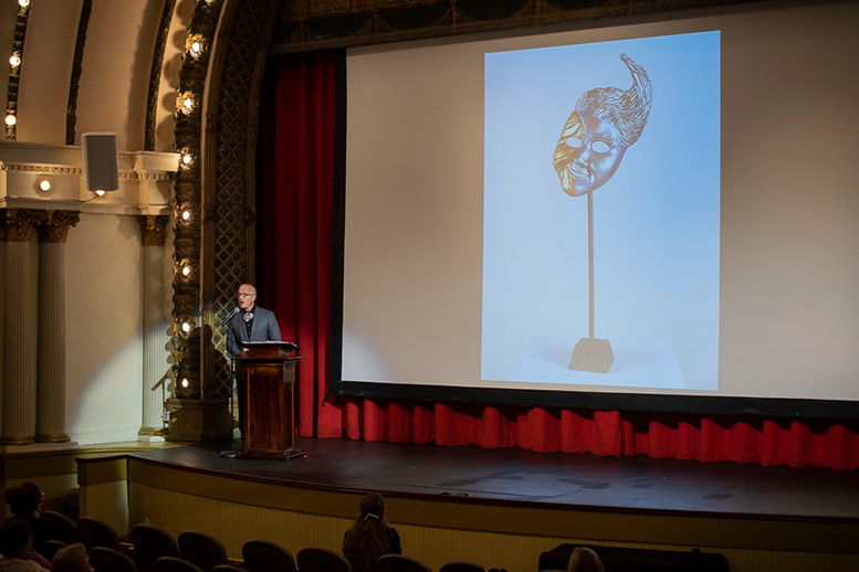Jonathan Becker is pictured introducing his design for the 2019 Mayor's Arts Awards. Photo by: Mike Rhodes