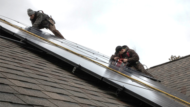 Solar panels being installed on a home. Photo provided
