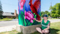 Artist Sarah Shaffer is pictured with her Box! Box! project titled: "To Bloom and Fly." Photo by: Mike Rhodes