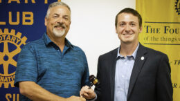 Mark McKinney (Left) is pictured handing the gavel over to new Muncie Sunrise Rotary President, Ben Polk. Photo provided