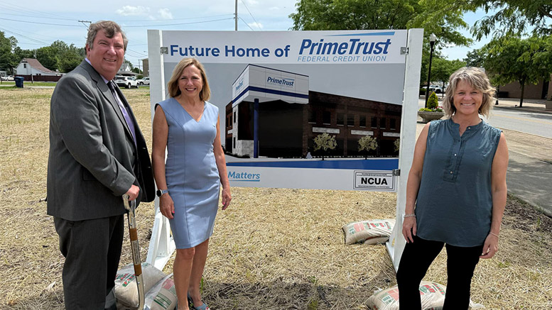 Pictured L-R: Tim Pierce, Lorraine Tomlin and Niccole Mansker stand by an artist rendering of the planned new branch. Photo provided.