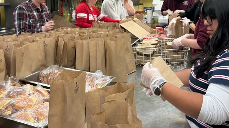 Volunteers are pictured preparing sack lunches at the Soup Kitchen of Muncie. Photo provided.