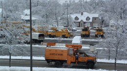From the archives: Electrical workers from around the country used the parking lot at Ball Memorial Hospital as a staging area during the ice storm of 2005. Photo by Mike Rhodes