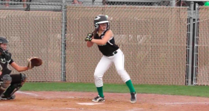 Anna Stanley steps up to the plate and hits a double.
