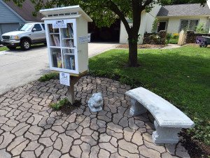 Seating area by the "Little Free Library."