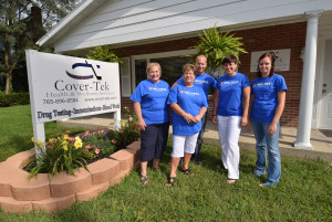 Cover-Tek staff outside their building at 926 W. Main St., Muncie
