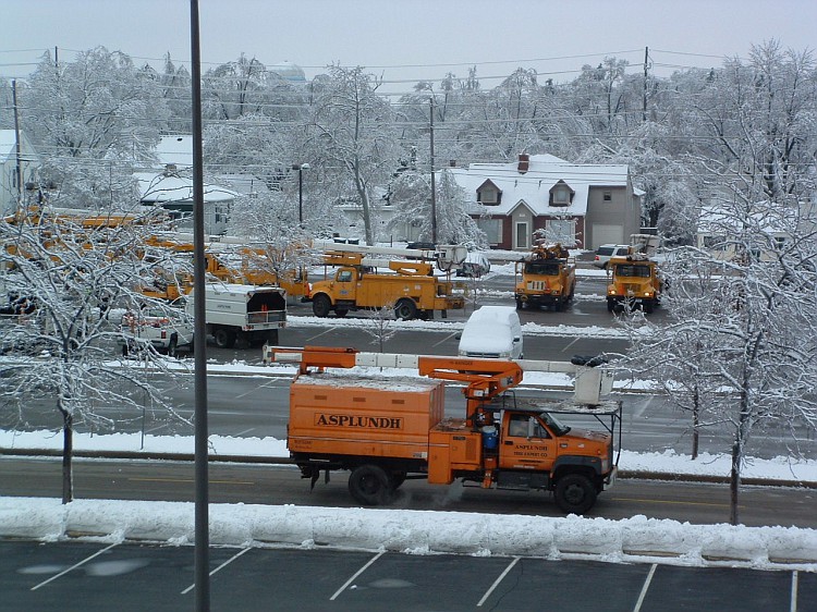 The Ice Storm of 2005. Electrical workers from across the country at their command post in a BMH parking lot. Photo by: Mike Rhodes