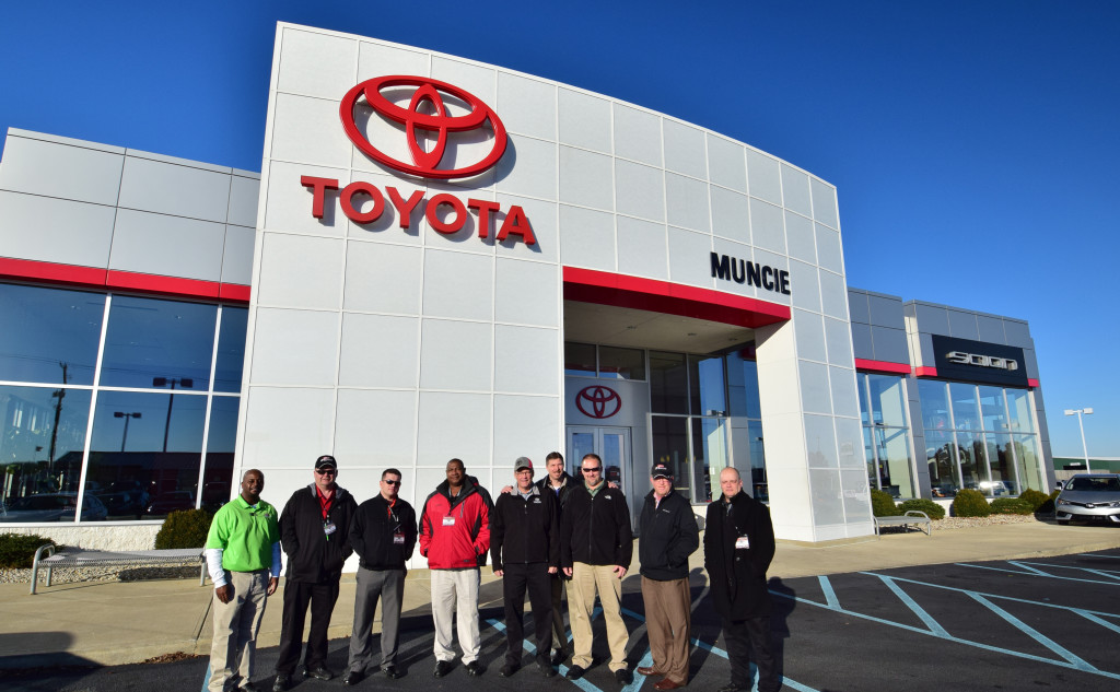 Some of the sales staff at Toyota of Muncie are pictured outside the dealership on November 25, 2015. Photo by: Mike Rhodes