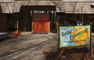 A banner in front of the Unitarian Universalist Church of Muncie proclaims the good news of solar power. Photo provided.
