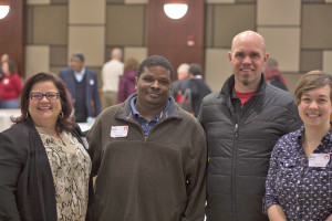 Representatives of the South Central neighborhood association (l-r): Nikki Fitzgerald, Brian Kemp, James Sandberg, and Sara Renee. The association won $1500 to use on a neighborhood project of their choosing.