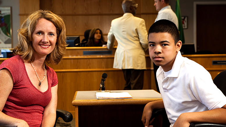 A CASA volunteer and a child in court. Photo provided.