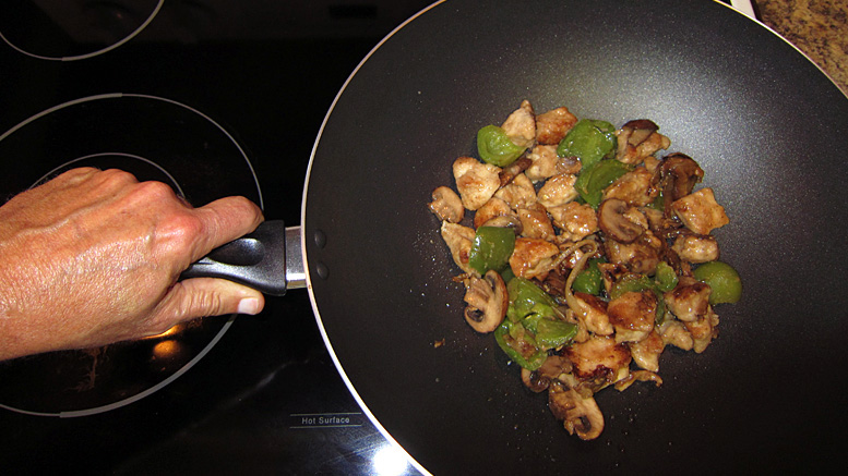 Culinary science proves that food cooked in woks automatically turns into moo goo gai pan. Photo by: Nancy Carlson
