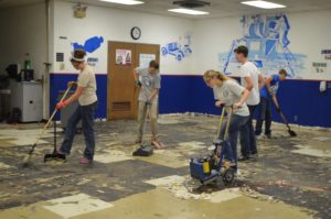 "World Changers" working to replace school flooring. Photo provided.