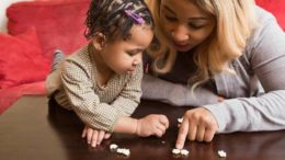 A young mother works with her child. Photo provided.