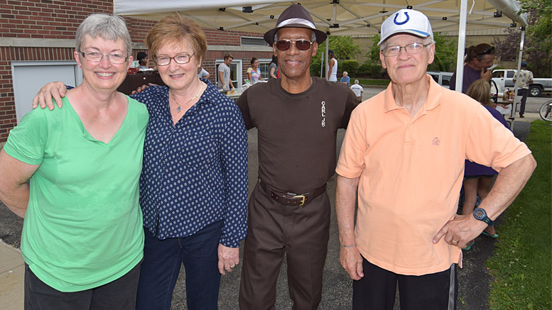 Pictured L-R: Loretta Parsons, Executive Director; Garnet Wince, Founder of Harvest Soup Kitchen; Carl Kizer, Jr.; Leland Wince, MD. Photo by: Mike Rhodes