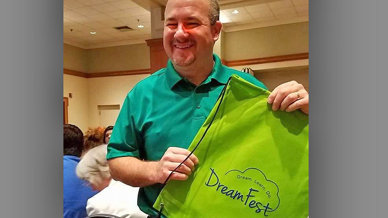 Matt Howell shows off his DreamFest "Dream Kit" he recently won at the Muncie on the Move breakfast. Photo provided.