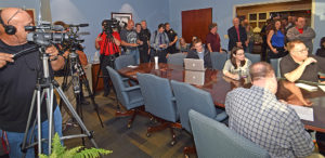 Members of the media, local officials, and members of the City of Muncie Police Department spilled out into the hallway during Friday's afternoon press conference. Photo by: Mike Rhodes