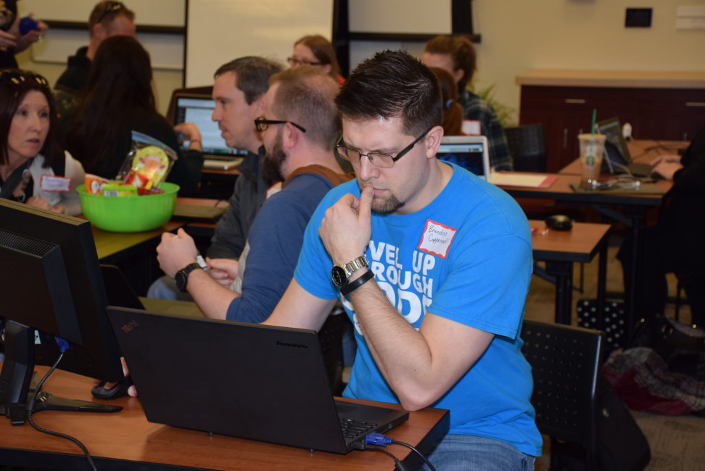 Brandon Coppernoll, a web developer on the Christian Ministries team, concentrates on the task at hand. 