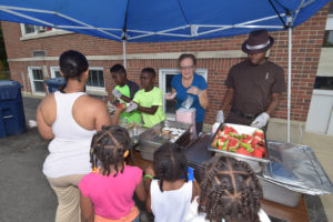 A scene from the Harvest Soup Kitchen's “Summer Fun Fest” held last year. File photo.