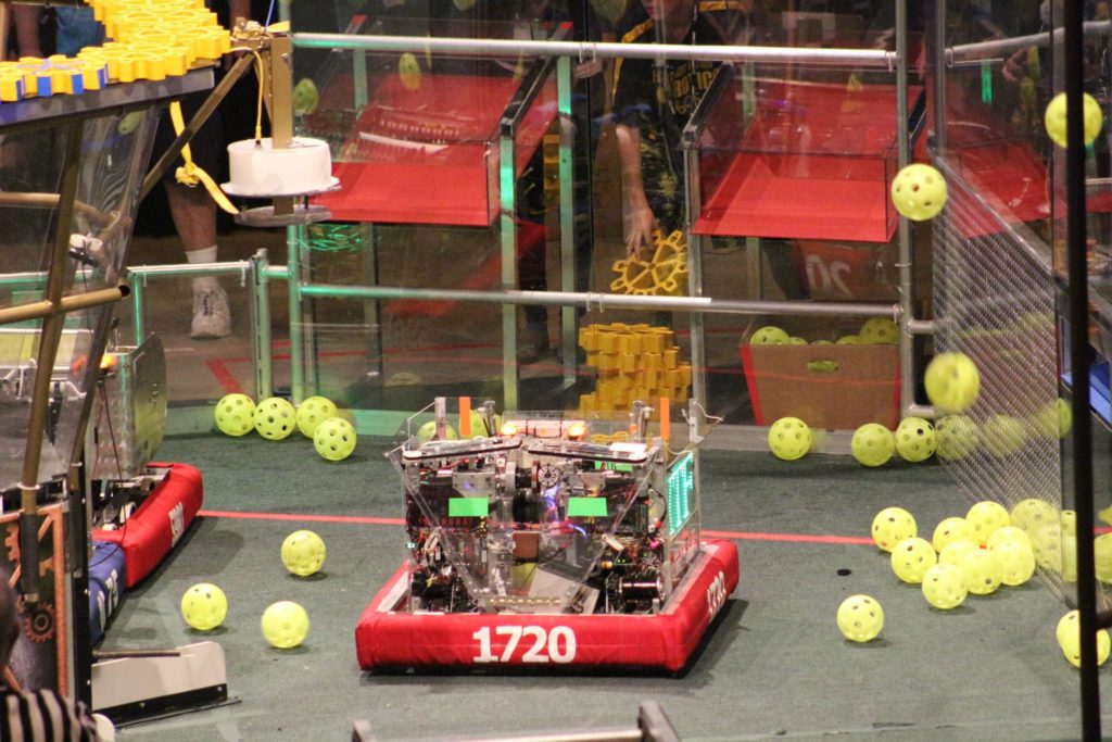 PhyXTGear's robot, "Spitfire" moves down the field after picking up a gear during a match. Photo provided.