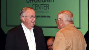 Kelly Stanley, YOC board member and campaign chair speaks with retired circuit court judge Steven Caldemeyer. Photo by: Kyle Evens, Berwyn Studios