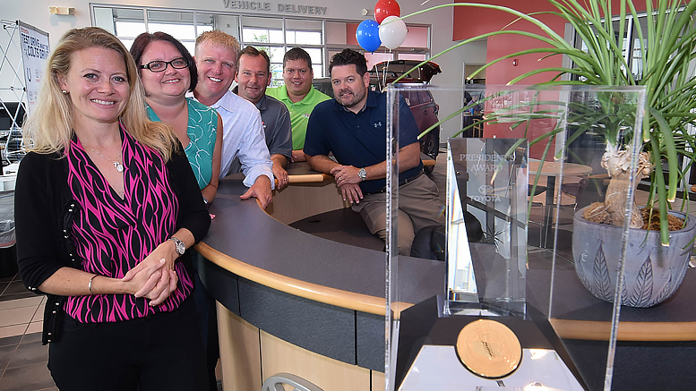 Pictured beside the Toyota President's Award are: (L-R) Melissa Daniels, Noel Walburn, Chad Castor, Scott McFeely, Daniel Bartrom and Jeff Daniels. Photo by: Mike Rhodes