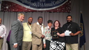 Awards were presented by NUSA president Tige Watts and accepted by Kenyonta Hudson, Whitely Community Council Executive Director; Cornelius and Mary Dollison; Rebecca Parker, Technology Coordinator for Muncie Public Library; and Frank Scott, Whitely Community Council President. Photo provided.