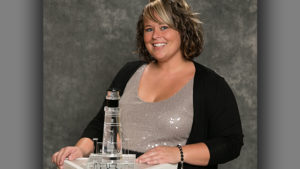 Erin Sellers, General Manager of the Red Lobster in Muncie, is pictured with her Lighthouse Club Award. Photo provided.