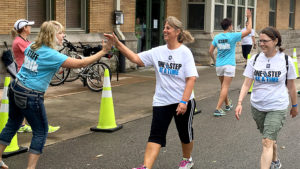 Walk Indiana participants are cheered on by Cardinal Greenway and event staff and volunteers, September 10, 2016. The non-competitive walking marathon will take place for the eighth consecutive year Saturday, Sept. 9 at the Wysor Street Depot in Muncie. Photo by: John D. Disher