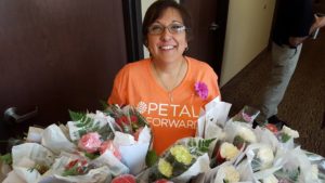 Sharon Grubbs is pictured with bouquets of happiness.