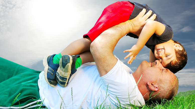 A father and son enjoying quality parenting time. By: graphicstock