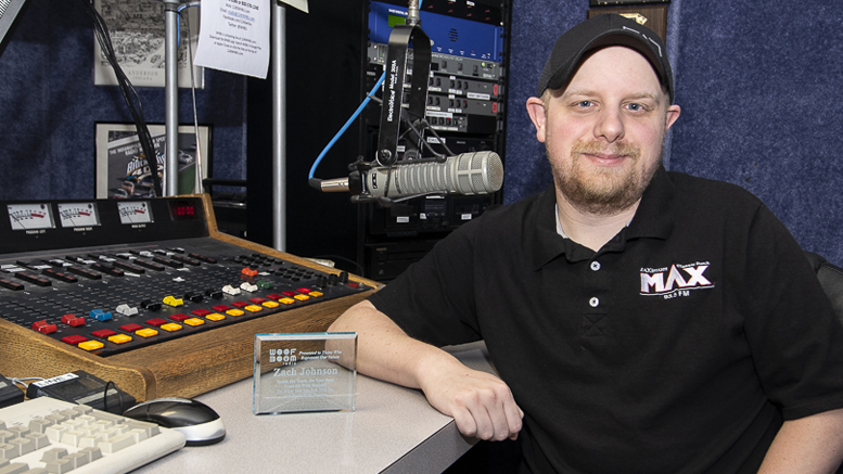 Zach Johnson is pictured in the studio with his award. Photo by: Mike Rhodes