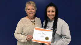Ivy (R) is pictured receiving her STAR scholarship certificate from P.E.O Cathy Stewart (L) on May 17 at Burris High School. Photo provided.