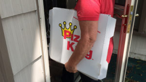 This is how not to carry a Pizza King pizza into your house. Photo by: John Carlson