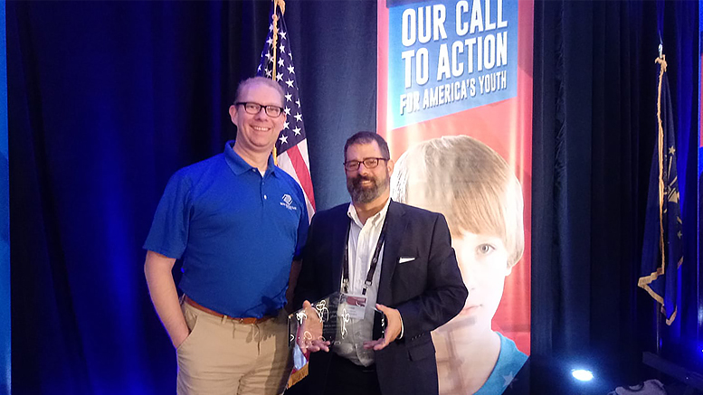 James Mitchell, Board President, and Jason Newman, Boys & Girls Clubs of Muncie CEO, accepted two awards at this year's Boys & Girls Clubs of America Regional Leadership Conference on October 11. Photo provided.