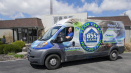 Mark Beaty is pictured in his carpet cleaning van in front of the offices of Woof Boom Radio. Photo by: Mike Rhodes