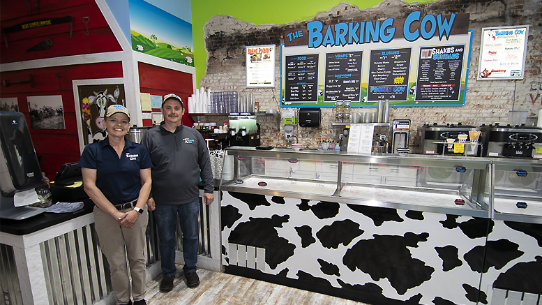 Store manager Danielle Woodson and owner Scott Mick are pictured. Photo by: Mike Rhodes