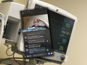 Monitor showing my blood pressure and a screenshot of a Facebook live I did from my hospital room.