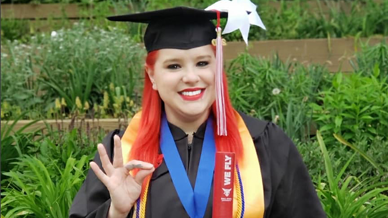 Class of 2020 graduate Brandi Lambertson gives the "Chirp Chirp" sign after graduation ceremonies held on Saturday at Scheumann Stadium. Photo by Aaron Walker