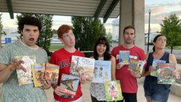 Wizard of Oz cast members Lion, Scarecrow, Dorthy, Tin Man and the Wicked Witch promoting summer reading book giveaway. Photo by: Stacy Wheeler.