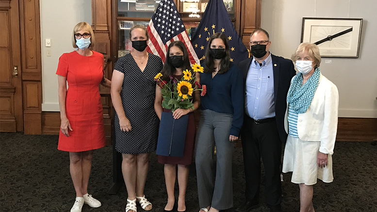 Brooke Stallings (holding sunflowers) is pictured with family members and State Rep. Sue Errington and Lieutenant Governor Suzanne Crouch. Photo provided